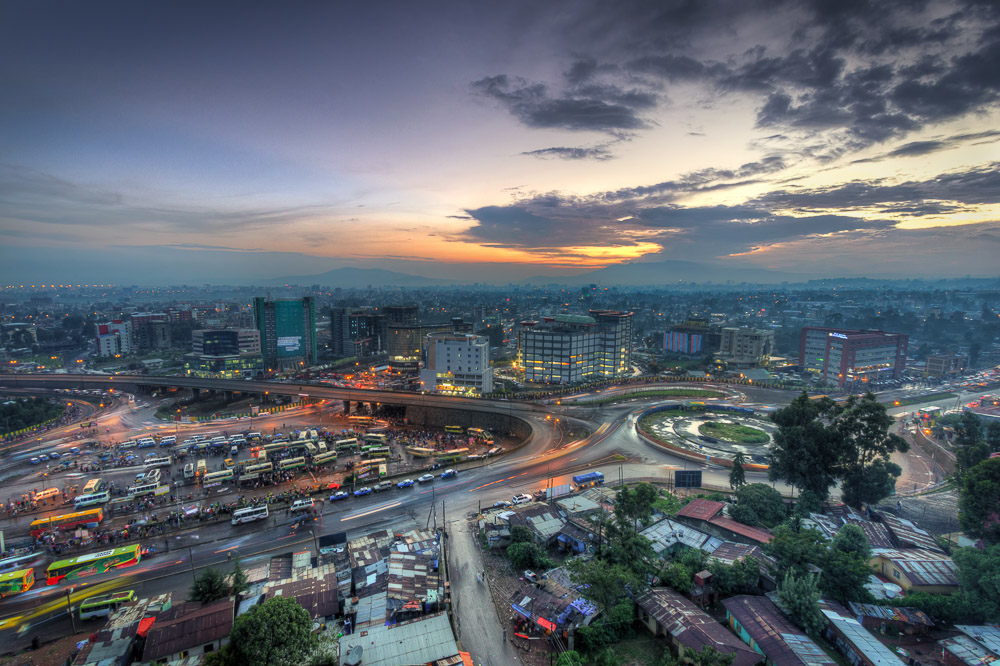 The hectic chaos of construction and city growth showing Megenanya during a sunset in the rainy season - Addis Ababa, Ethiopia